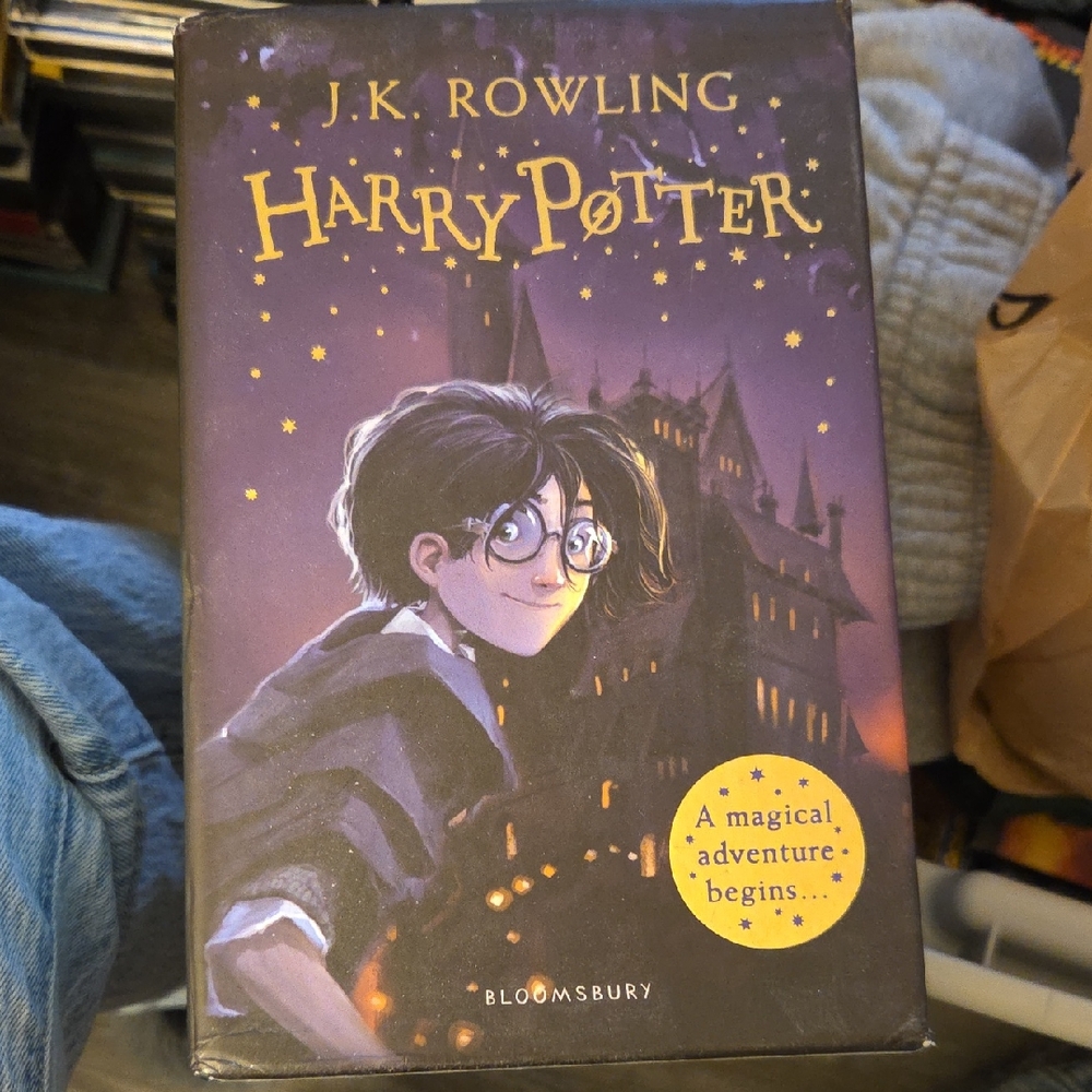 Harry Potter Book by Bloomsbury - Black and Purple Cover